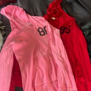 2 pink hooded thermal shirts